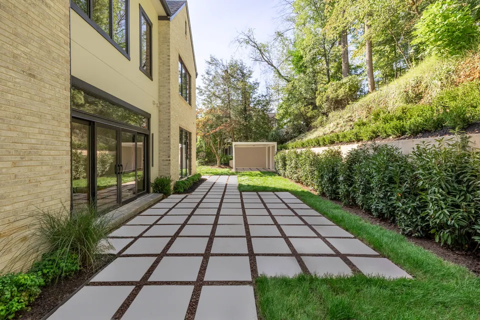 Rear lawn with paver walkway
