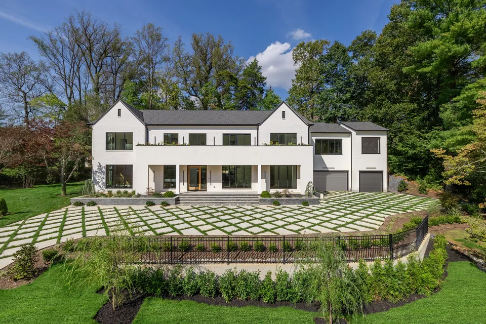Front of the house with paver motor court