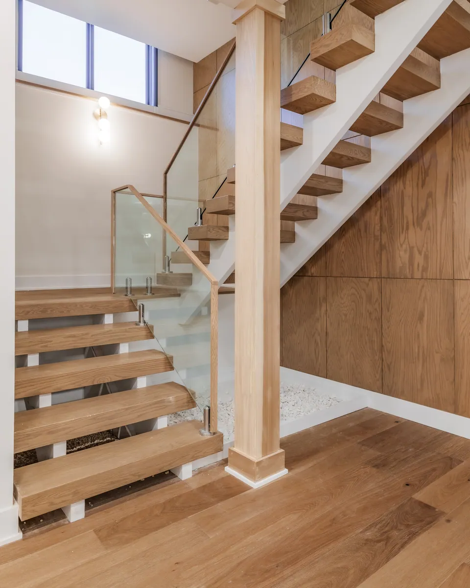 Floating staircase with glass railing