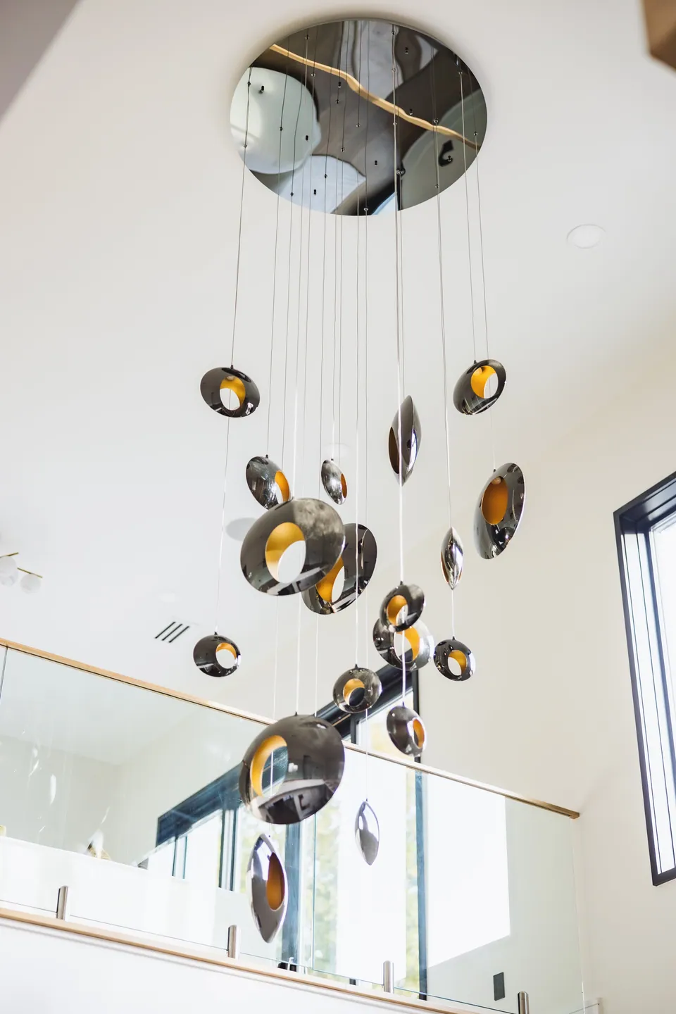 Sculptural chandelier in the double-height foyer